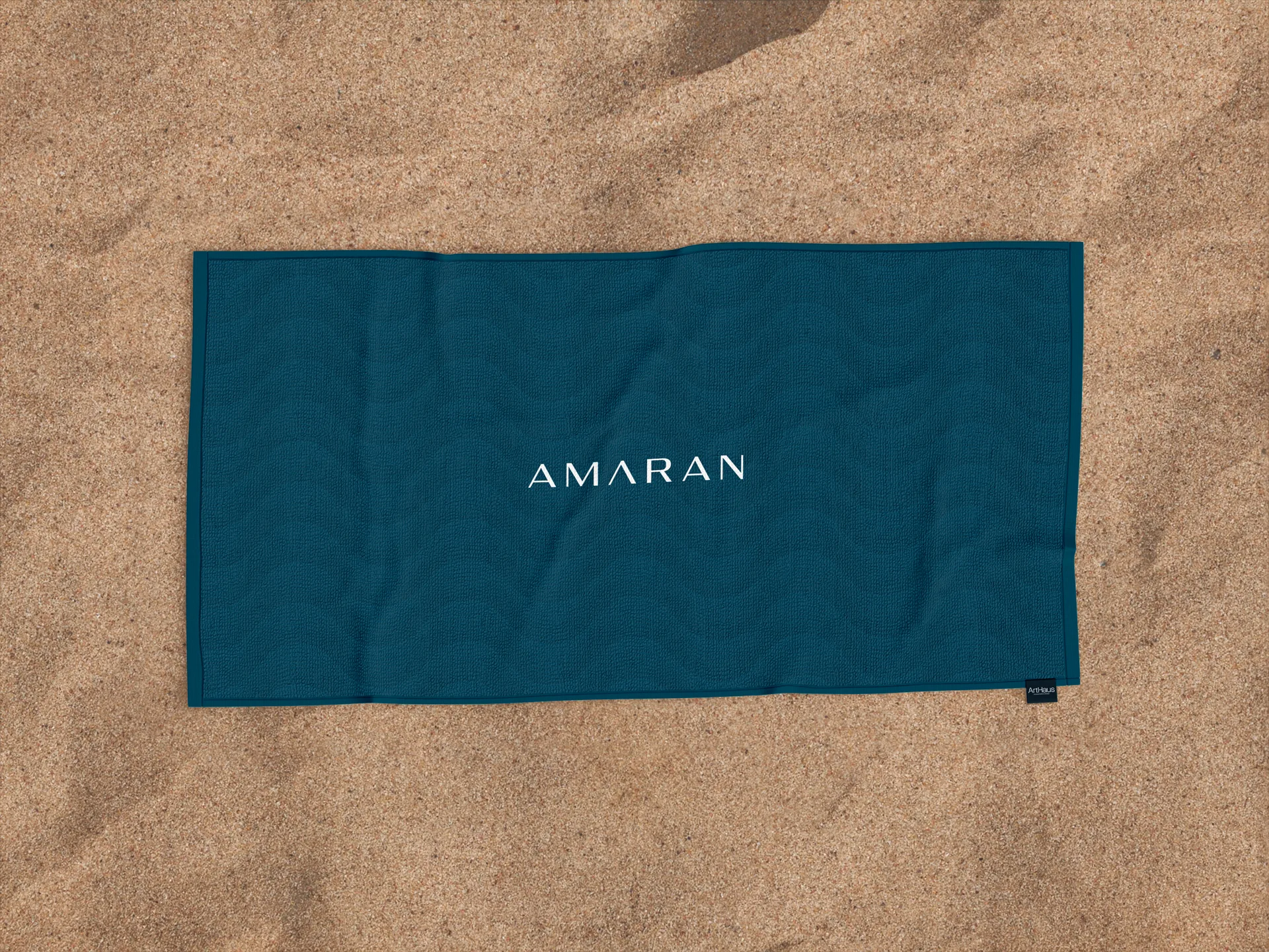 Amaran — Toalha de praia com identidade visual